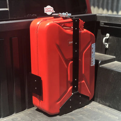 Red Wavian 20L jerry can locked in a front-loading steel holder on the side of a truck bed